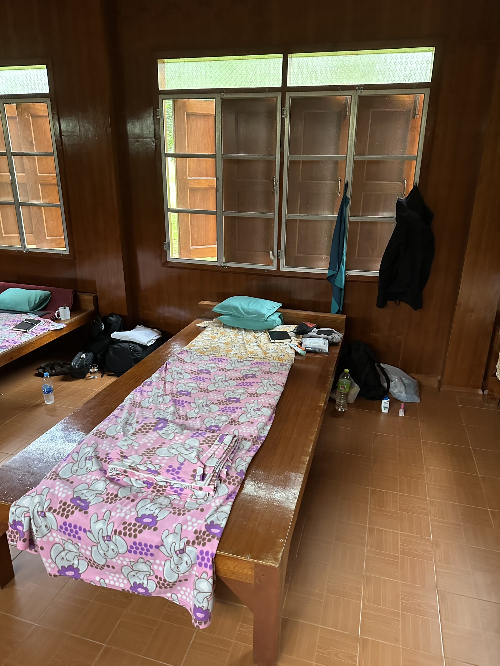 Shared dorm room with wooden beds